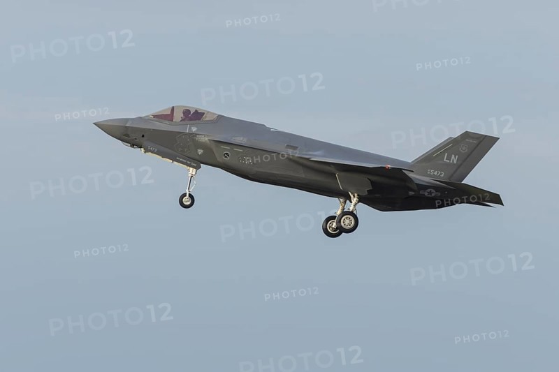 Lockheed Martin F-35 Lightning II fighter military aircraft of the United States air force USAF in flight landing at RAF Lakenheath airbase, Suffolk, England, United Kingdom