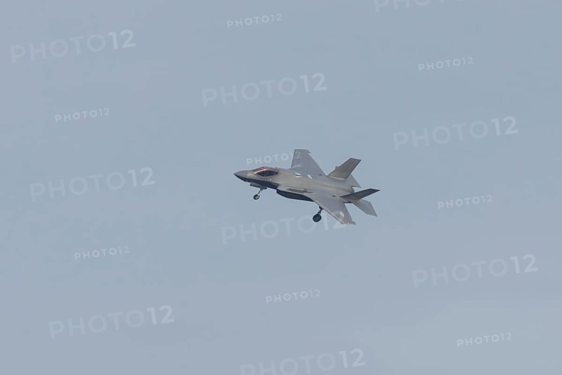 Lockheed Martin F-35 Lightning II fighter military aircraft of the United States air force USAF in flight landing at RAF Lakenheath airbase, Suffolk, England, United Kingdom