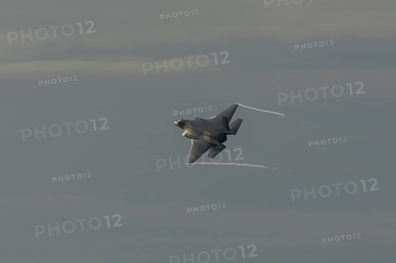 Lockheed Martin F-35 Lightning II fighter military aircraft of the United States air force USAF in flight at RAF Lakenheath airbase, Suffolk, England, United Kingdom