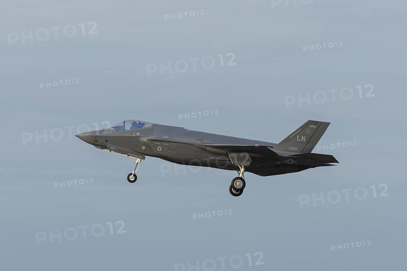 Lockheed Martin F-35 Lightning II fighter military aircraft of the United States air force USAF in flight landing at RAF Lakenheath airbase, Suffolk, England, United Kingdom