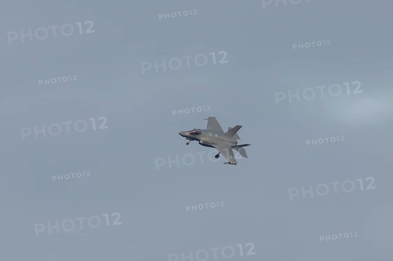 Lockheed Martin F-35 Lightning II fighter military aircraft of the United States air force USAF in flight landing at RAF Lakenheath airbase, Suffolk, England, United Kingdom