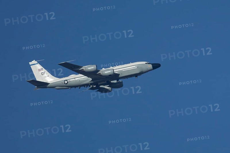 RC-135W Rivet Joint military jet aircraft of the United States Air Force USAF flying, England, United Kingdom