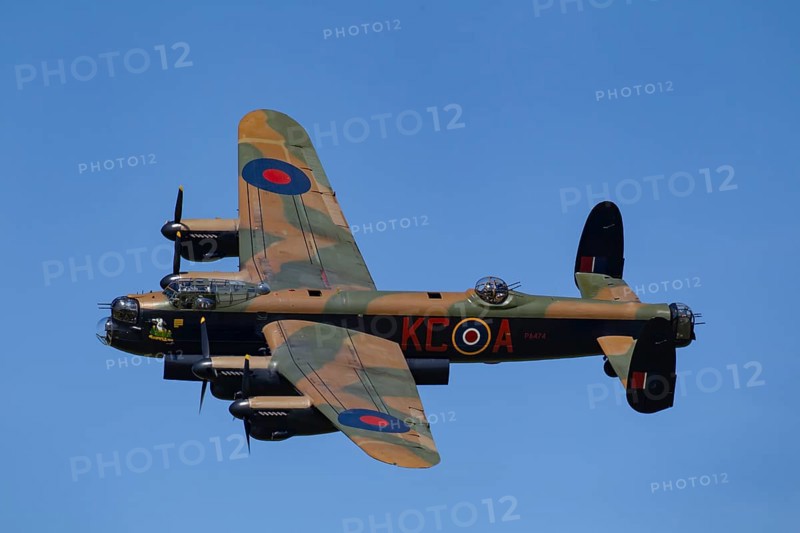 Avro Lancaster warbird military aircraft in Royal air force RAF colours flying, England, United Kingdom