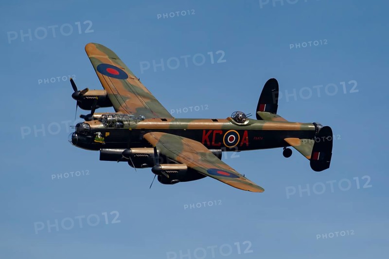 Avro Lancaster warbird military aircraft in Royal air force RAF colours flying, England, United Kingdom