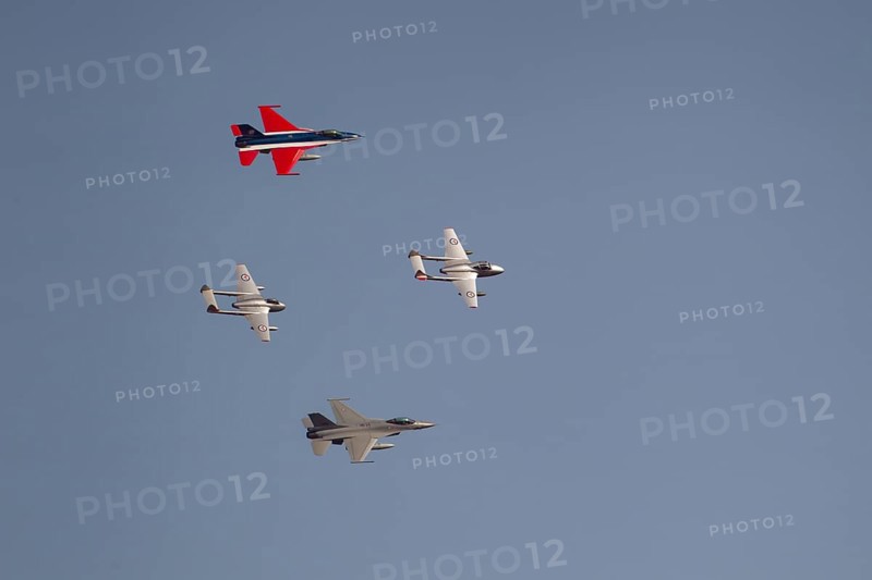 General Dynamics F-16 Fighting Falcon and de Havilland Vampire military jet aircraft of the Royal Norwegian Air Force flying in formation, England, United Kingdom