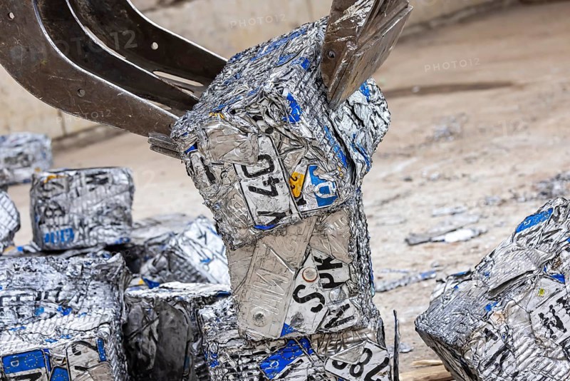 Cubes made from scrap metal, disused car licence plates. Symbolic photo. Stuttgart, Baden-Württemberg, Germany