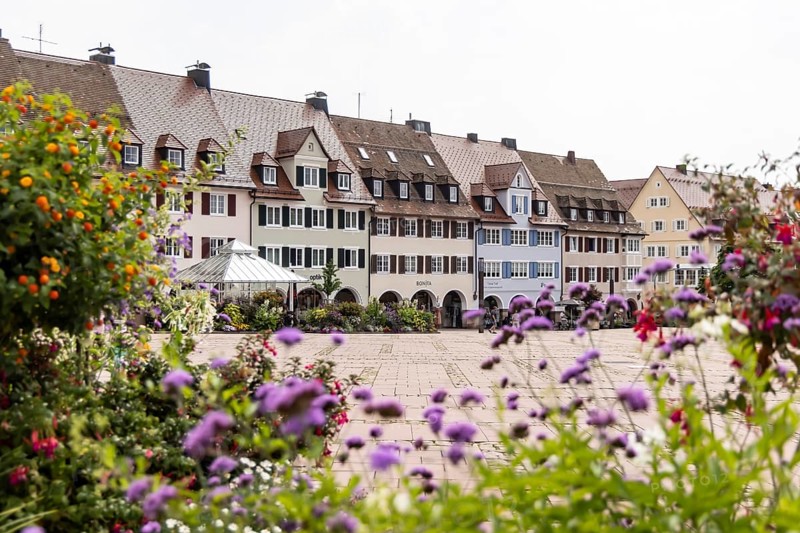 Houses on the market square in Freudenstadt in the Black Forest, the largest built-up market square in Germany. The 219 by 216 metre square is the town's landmark. Freudenstadt, Baden-Württemberg, Germany