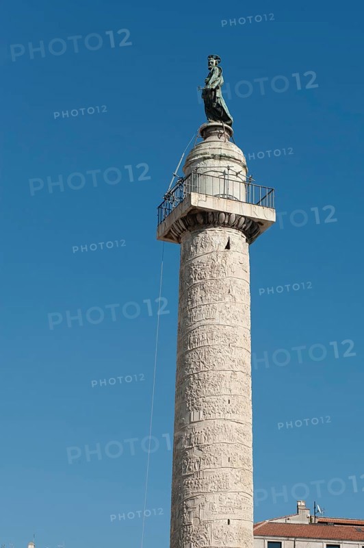 Above statue of Saint Peter Statue of Saint Peter the Apostle on 40 metre high Trajan's Column Victory Column Column of honour for Roman Emperor Trajan, below statue small platform circulation with railing, Trajan's Forum, Rome, Lazio, Italy