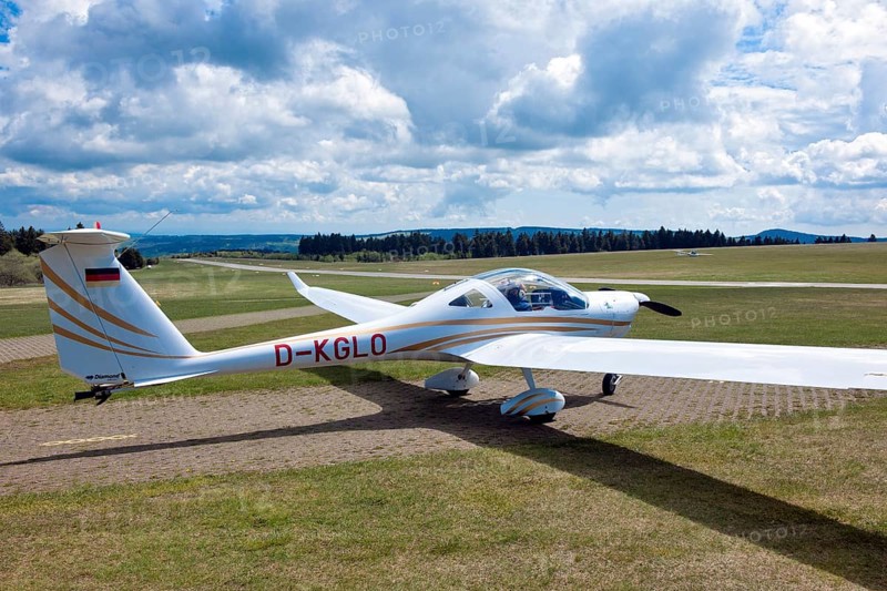 Motorised glider taxiing to the runway at Wasserkuppe airfield, Rhön, Gersfeld, Fulda district, Hesse, Germany