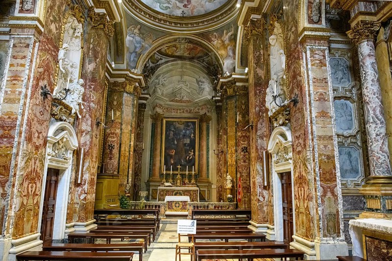 Nave with chancel of the baroque church Chiesa di San Nicola dei Lorenesi in baroque architecture, Rome, Lazio, Italy