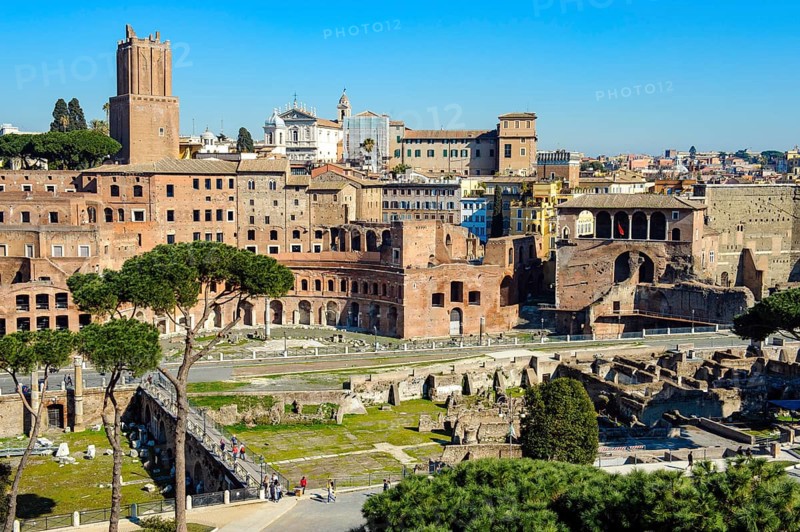 View from elevated position on Roman hill Quirinal Quirinal Hill with in front Forum of Roman Emperor Trajan with in the back left Trajan's Markets Markets of Trajan Mercati di Traiano and Museum of the Imperial Forums, Museum of the Imperial Forums, Museo dei Fori Imperiali, in the centre of the picture modern street Via Alessandrina shares historical ancient Trajan's Forum, Rome, Latium, Italy