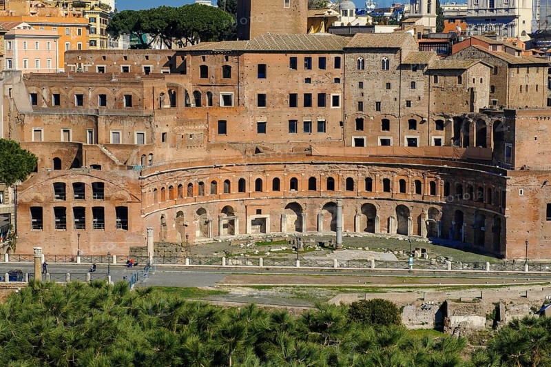 View from elevated viewpoint on Trajan's markets in part of Trajan's Forum Forum of Roman Emperor Trajan part of imperial forums, in front modern street Via Alessandrina divides historical ancient Trajan's Forum, Rome, Lazio, Italy