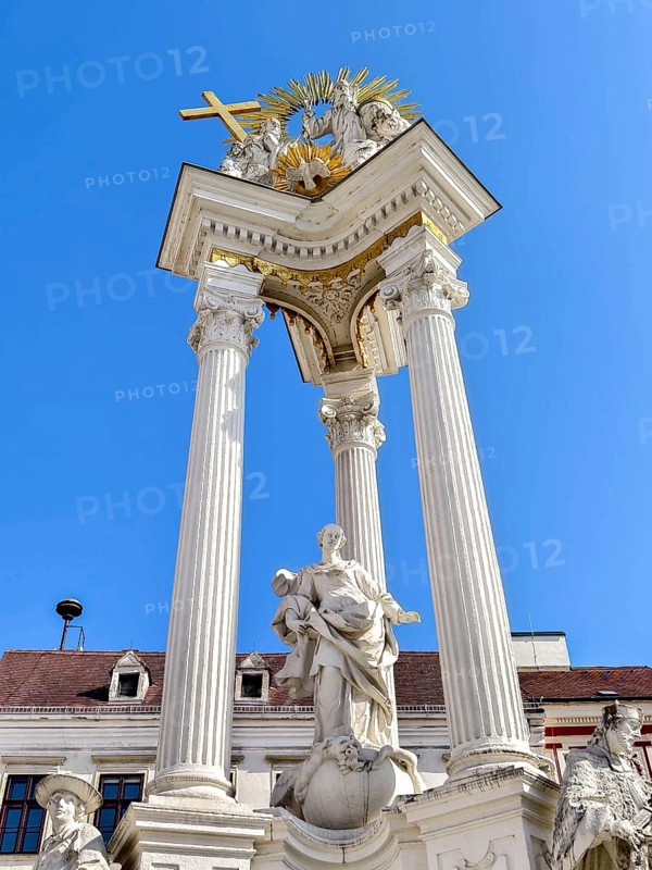 Magnificent monument with columns and statues under a bright blue sky Trinity Column Old Town Krems Wachau Waldviertel Lower Austria Austria