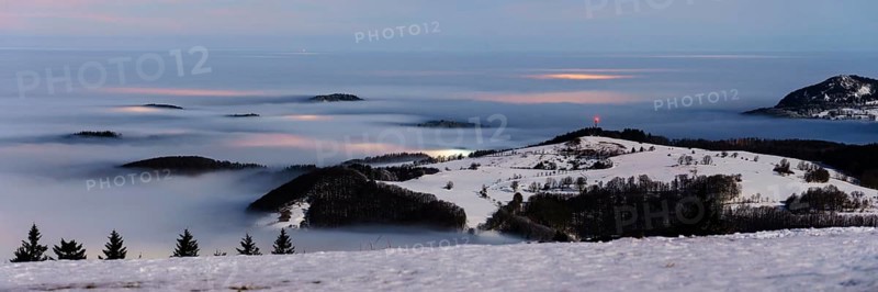 View from the Wasserkuppe in winter, dusk, Hessian Rhön nature park Park, Hesse, Germany