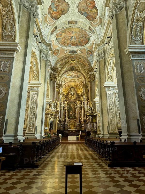 Magnificently decorated baroque interior with altar and ceiling frescoes, atmospheric play of light, Klosterneuburg Lower Austria Austria
