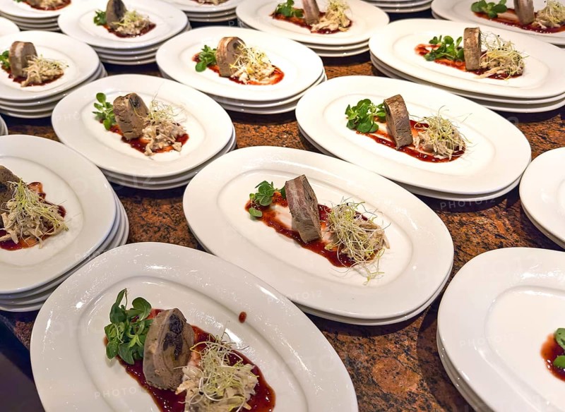 Elegant arrangement of appetiser plates with meat, salad and sauce in a buffet presentation Lower Austria Austria
