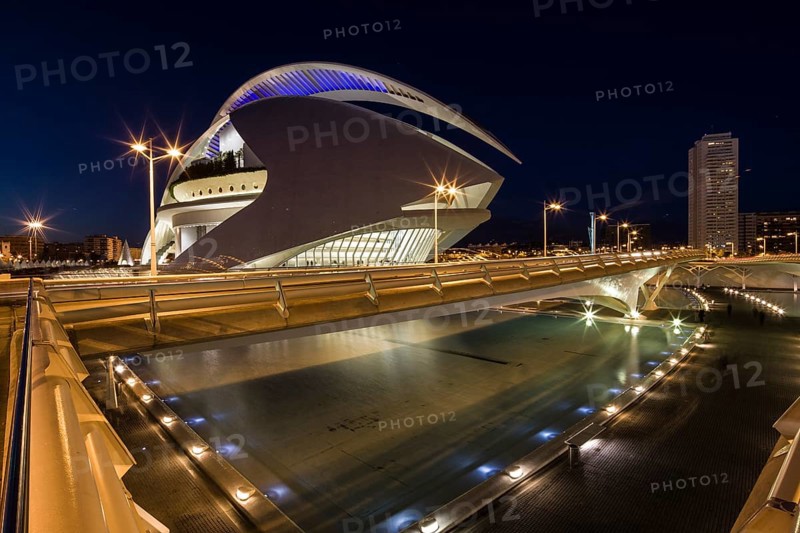 Valencia Spain Bright futuristic building and bridge illuminated at night in urban surroundings Opera