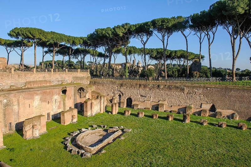 View of part of ancient historical Palatine Stadium Hippodrome on Palatine Hill of Emperor Domitian with crescent-shaped small fountain on the left, Palatine Hill, Rome, Lazio, Italy