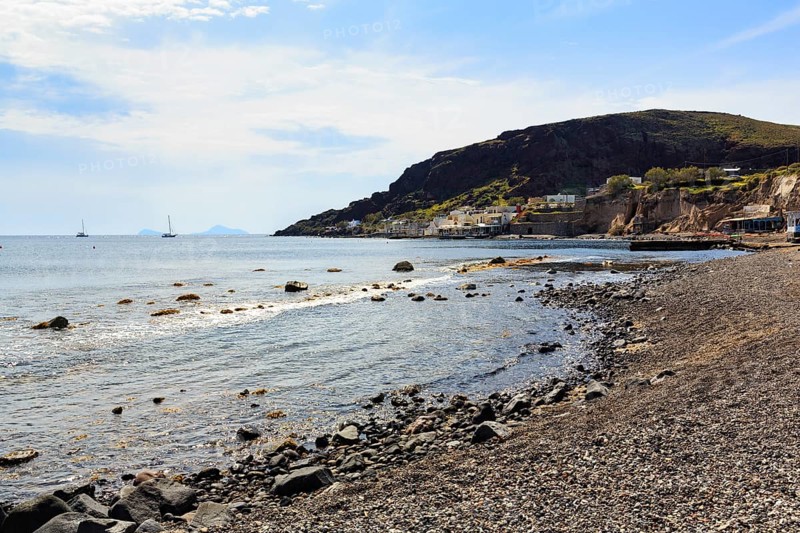 Akrotiri Beach, quiet empty pebble beach, coastline near Akrotiri, Santorini, Cyclades, Greece