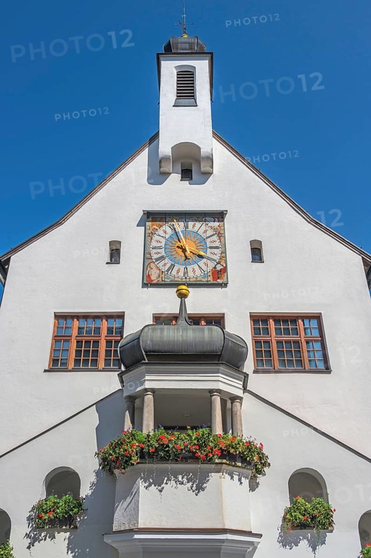 West faÃ§ade with clock and floral decoration, town hall, Kempten, AllgÃ¤u, Bavaria, Germany