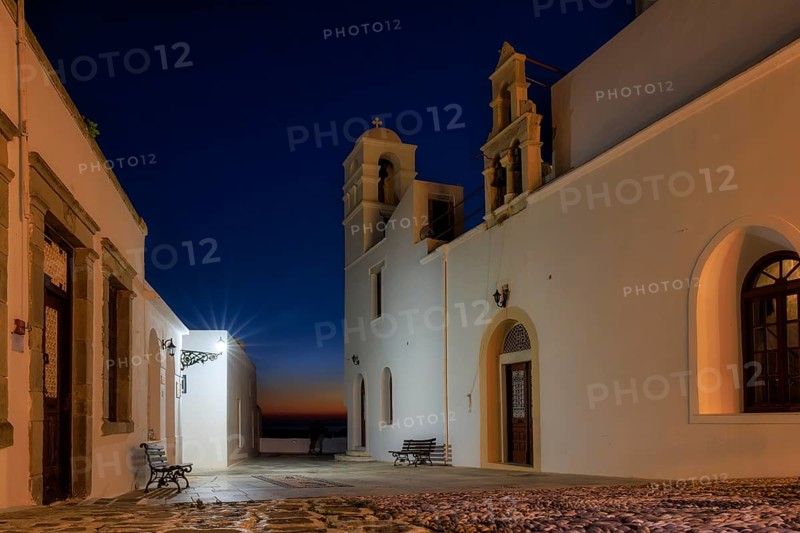 Evening light at the main square of the village Plaka, Milos, Cyclades Islands, Greece