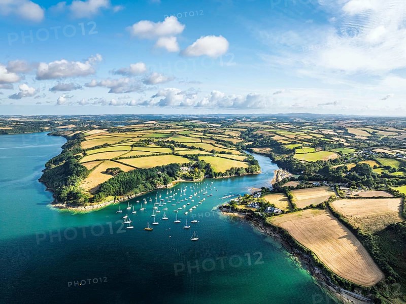 Farms and Fields over St Mawes from drone, Carrick Roads, River Fal, Falmouth, Cornwall, UK