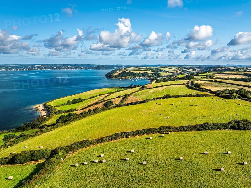 Farms and Fields over St Mawes from drone, Carrick Roads, River Fal, Falmouth, Cornwall, UK