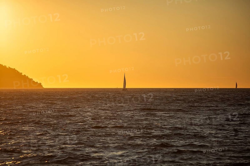 Sunset over the sea, sailing ship, near Starigrad, Dalmatia, Croatia