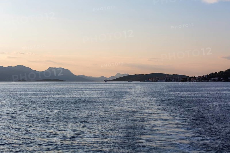View from the sea to the Makarska mountains in the morning light, near Korcula, Dalmatia, Croatia