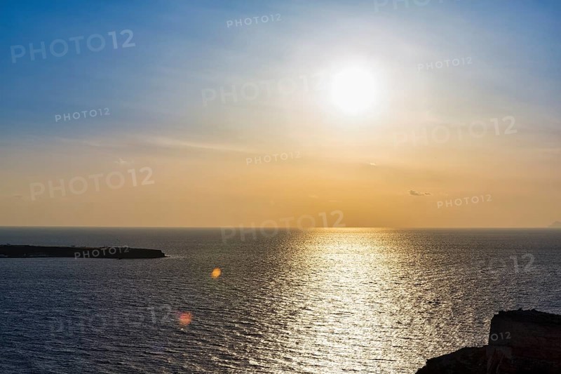 Sunset by the sea, Halo, Cirrus, Oia, Thira, Santorini, Cyclades, Greece