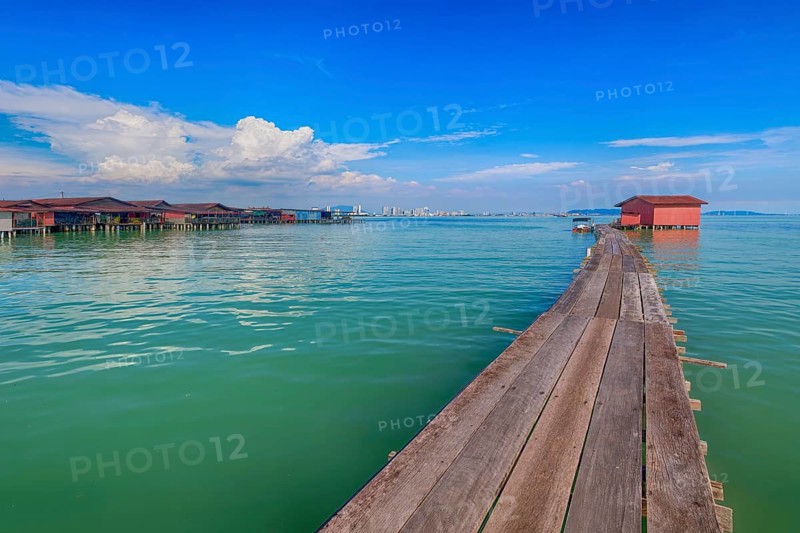 Boardwalk leading to a wooden house, Tan Jetty, George Town, Penang, Malaysia