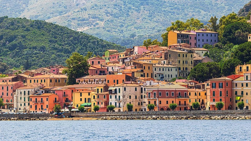 The village of Rio Marina with its pastel-coloured house facades, Elba Island, Tuscan Archipelago National Park, Tuscany, Italy