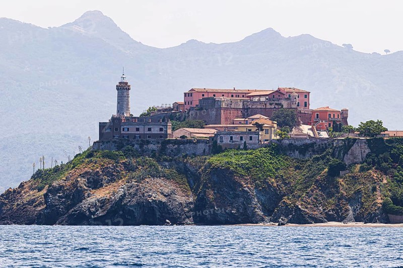 Fortress Forte Stella with lighthouse, behind the mountains Monte Serra and Monte Strega, Portoferraio, Elba Island, Tuscan Archipelago National Park, Tuscany, Italy