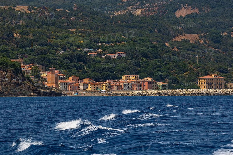 The village of Rio Marina with its pastel-coloured house facades, Elba Island, Tuscan Archipelago National Park, Tuscany, Italy