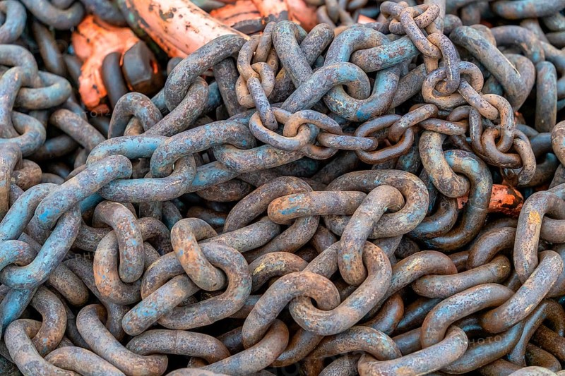 Detail shot of tangled rusty chains