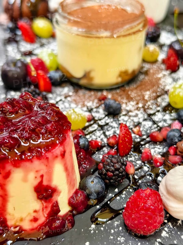 Various desserts with berries and chocolate, skilfully arranged on a plate Lower Austria Austria