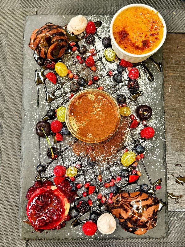 Various art desserts with chocolate and fruit on a decorative platter Lower Austria Austria
