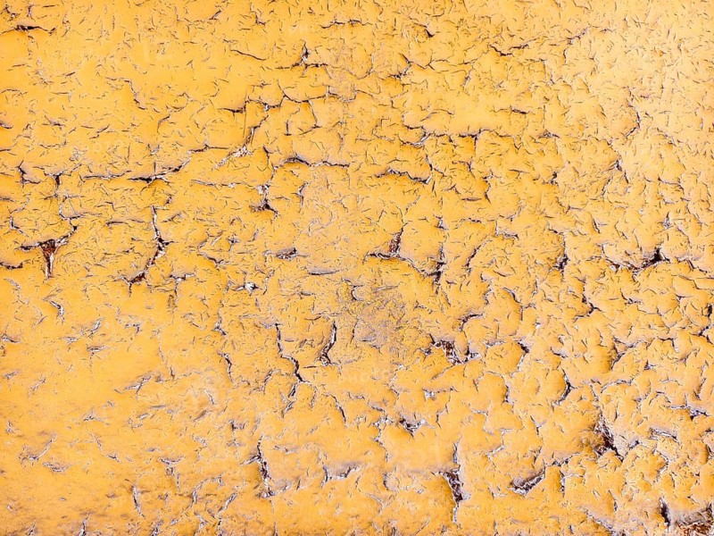 Yellow wall with cracked and peeling surface Lower Austria Austria