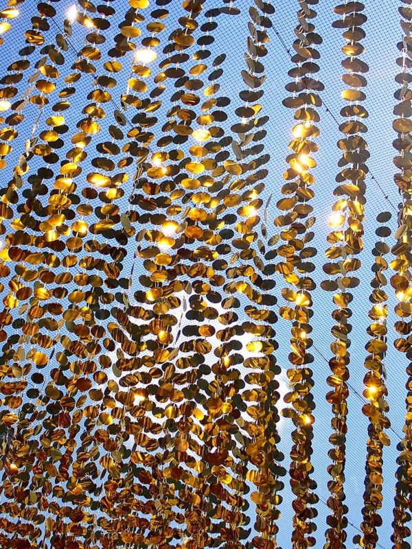 Golden garlands shine in the sun as a background, North Rhine-Westphalia, Germany