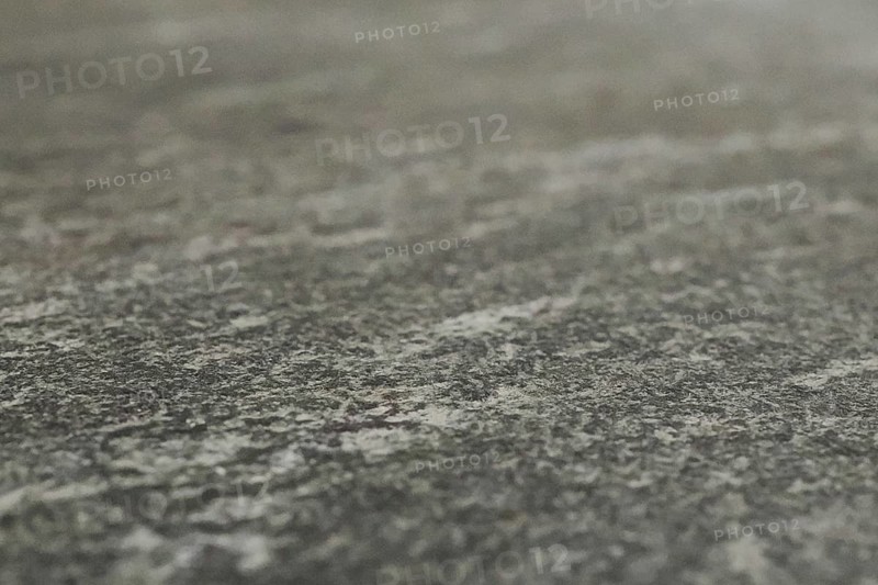 Grey granite surface as background, blurred background, North Rhine-Westphalia, Germany