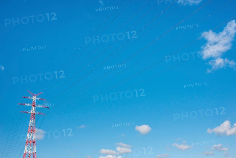 An extremely high electricity electricity electricity pylon, marked white and red, on the banks of the Elbe, river bank, Elbe crossing 2, 227 m high, highest overhead line pylon in Europe, blue sky with small white clouds, cables, lines with red and white marked balls, high-voltage pylon, overhead line pylon, overhead line, colour marking, safety, aviation safety, technology, structure, near Hollern-Twielenfleth, Lühe, Altes Land, Lower Saxony, Germany