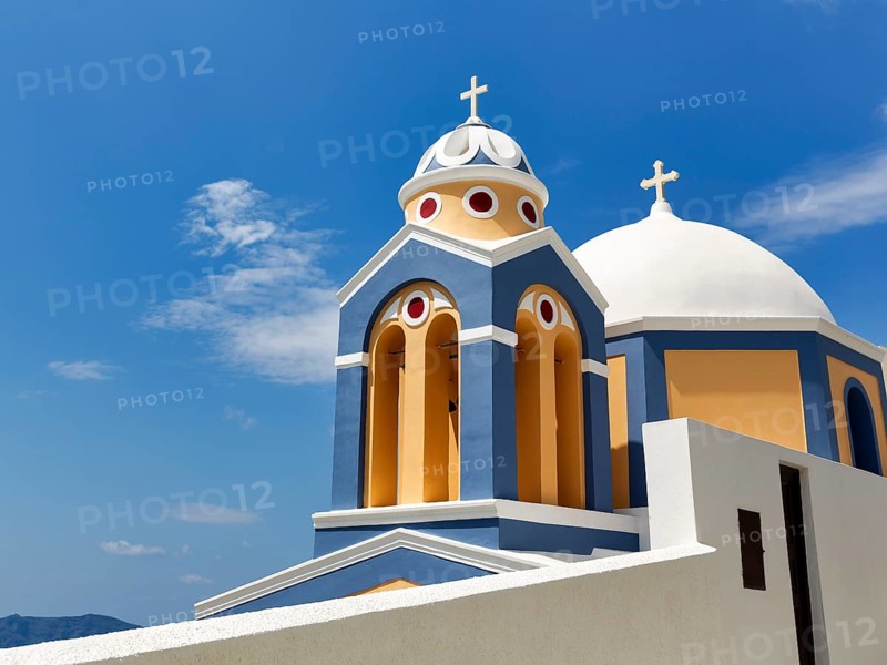 Catholic Church of Saint Stylianos, colourful facade, domes, Fira, Thira, Santorini, Cyclades, Greece