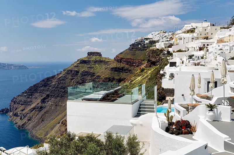 Sun terrace and white holiday homes, cliffs, caldera, Skaros rock formation, Firostefani, Thira, Santorini, Cyclades, Greece