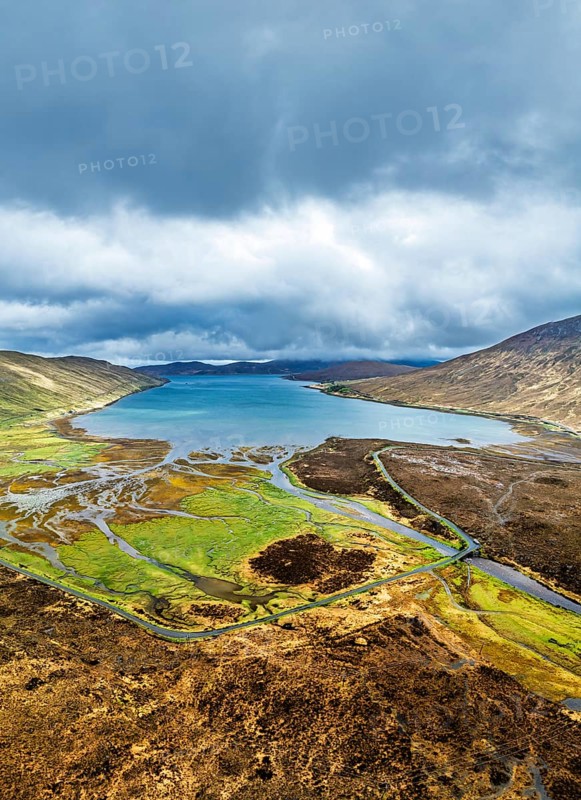 View from Eas a' Bhradain Waterfall from drone, Red Cuillin mountains, Loch Ainort, Isle of Skye, Scotland, UK