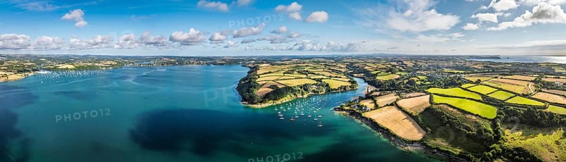 Panorama of Farms and Fields over St Mawes from drone, Carrick Roads, River Fal, Falmouth, Cornwall, UK