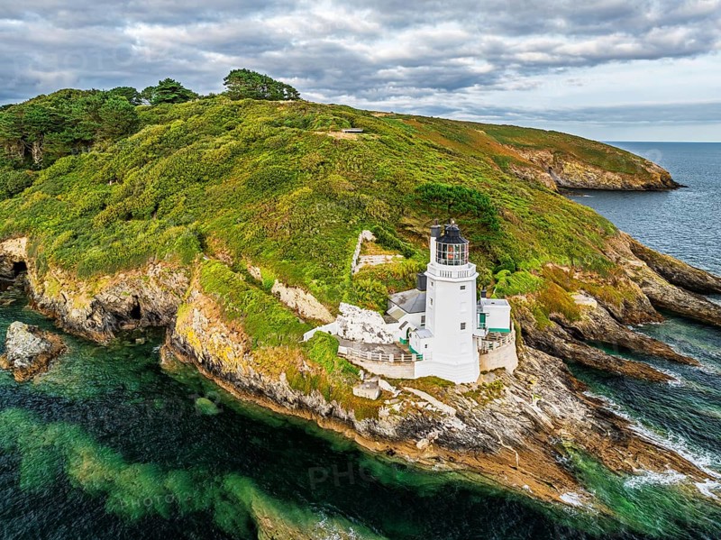 St Anthony Lighthouse from drone, Roseland peninsula, Head circular walk, Cornwall, UK