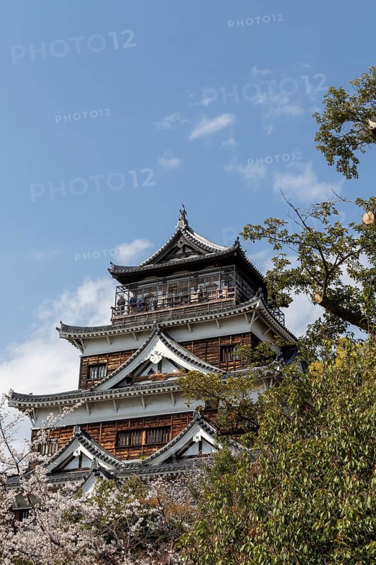 Hiroshima Castle, also known as Carp Castle, against a blue sky, replica of the original destroyed in the atomic bombing, sight, tourist attraction, Naka Ward, Hiroshima, Japan