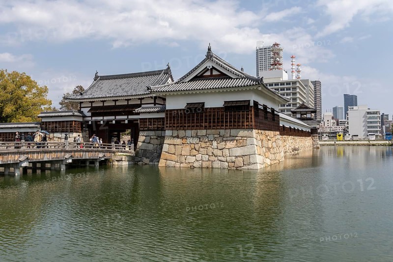 Hiroshima Castle, also known as Carp Castle, entrance gate and moat, replica of the original destroyed in the atomic bombing, sight, tourist attraction, Naka Ward, Hiroshima, Japan