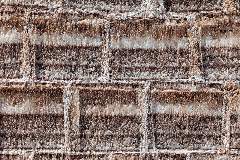 Close-up of a textured brick wall in earthy brown tones, A wall made of salt bricks in the Salar de Uyuni in Bolivia