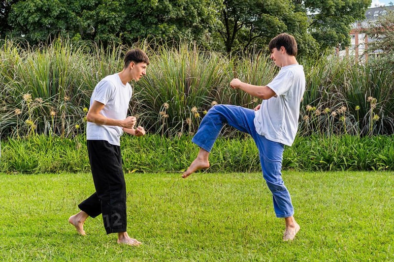 A dynamic Taekwondo session under the sun